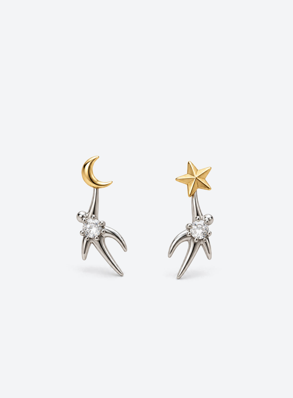 Mismatched two-tone moon and star stud earrings