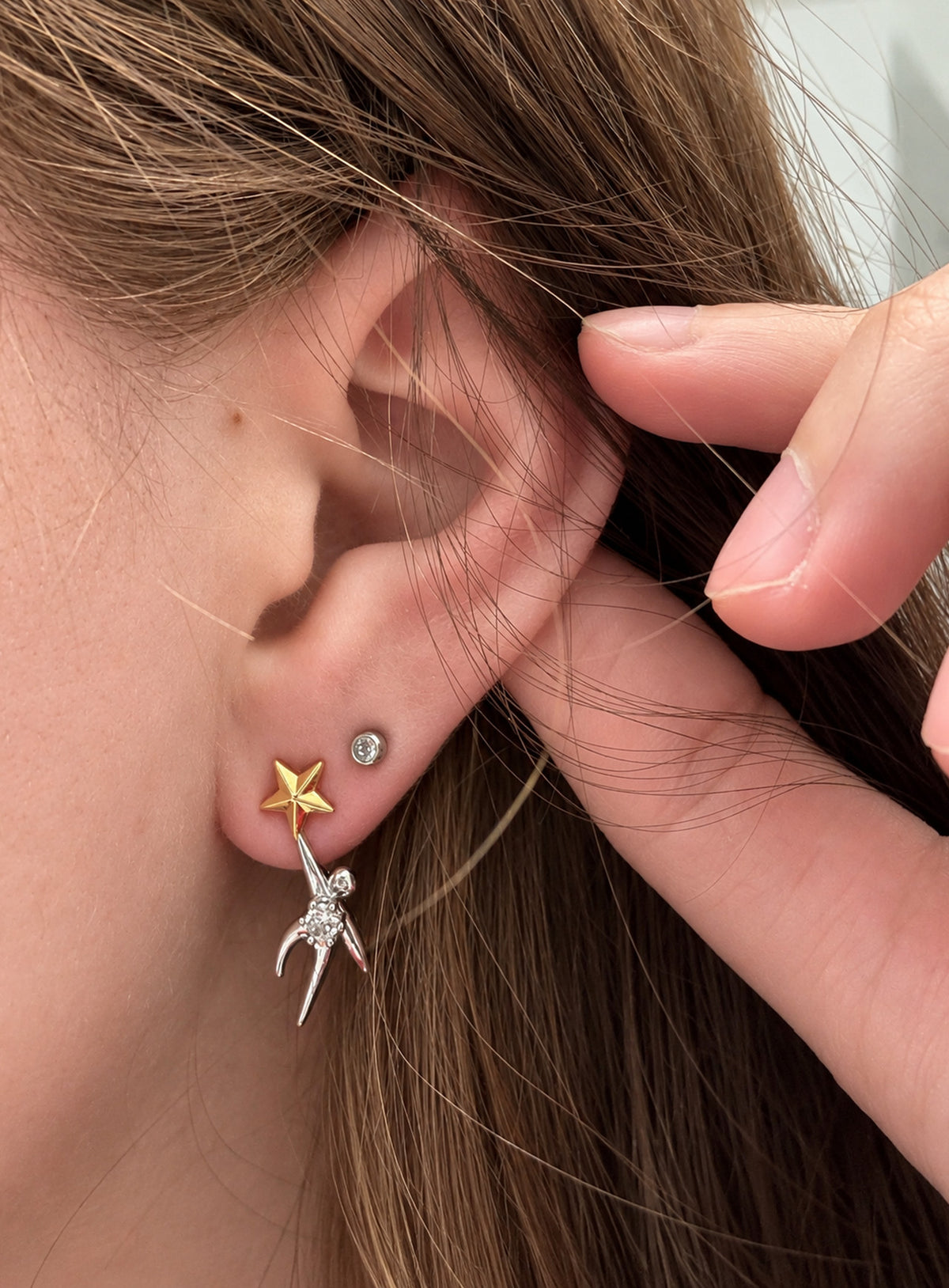 Mismatched two-tone moon and star stud earrings