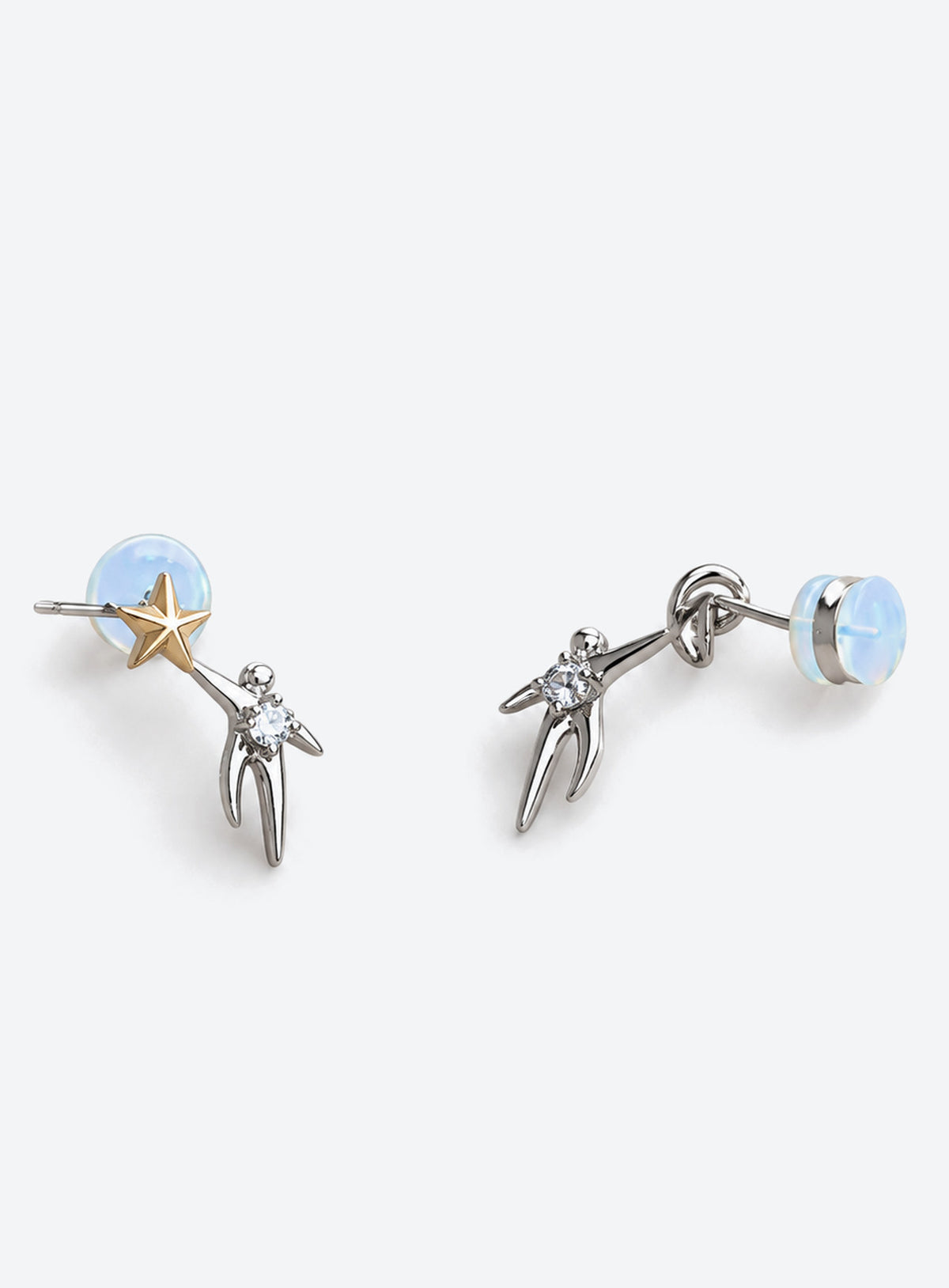 Mismatched two-tone moon and star stud earrings