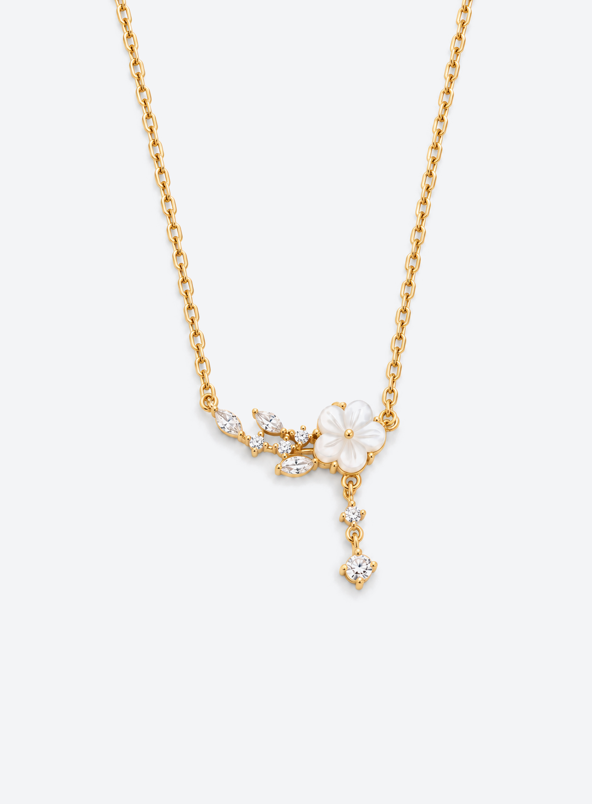 Mother of pearl flower necklace with marquise CZ leaf accents and a crystal drop