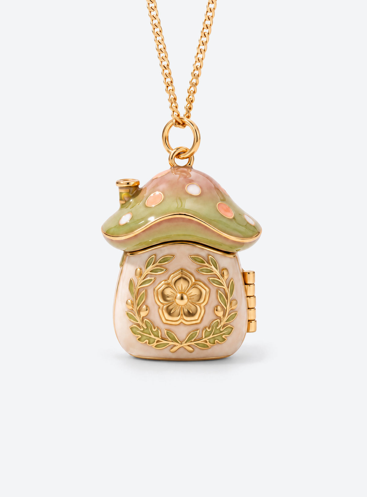 Gold-tone necklace with an enamel mushroom house locket and a hinged door