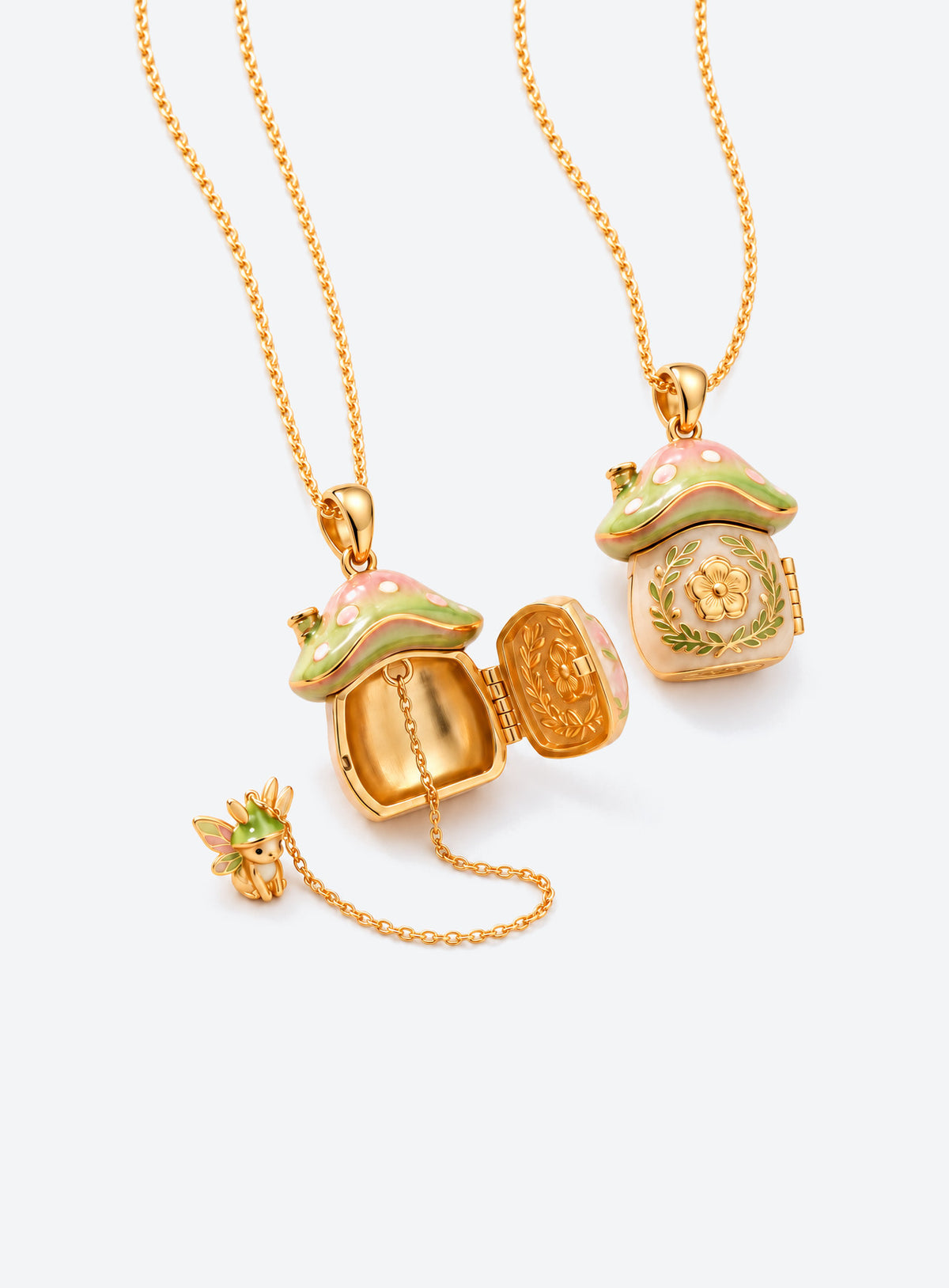 Gold-tone necklace with an enamel mushroom house locket and a hinged door