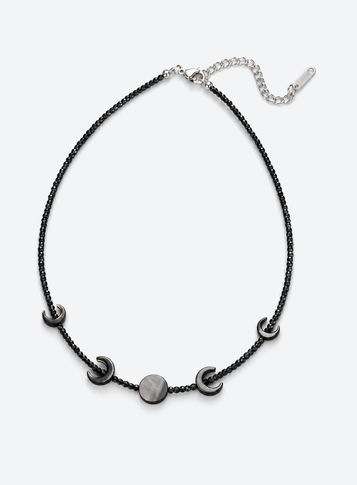 Black beaded necklace with four outward-facing shell crescents around a round center disc and a silver-finish clasp. (Silver)