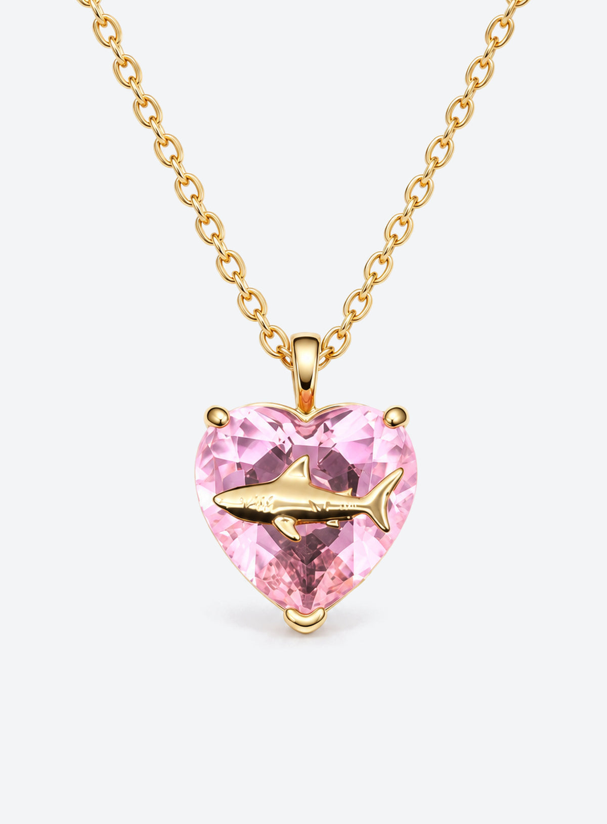 Heart-shaped crystal pendant necklace with a small gold-tone sea motif (October)