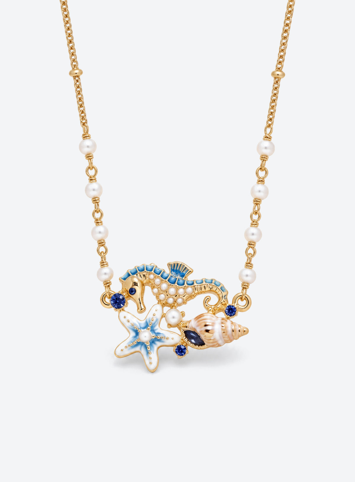 Ocean-themed necklace with a pearl station chain and a cluster of shells, sea creatures, or colorful fish (Seahorse Starfish)