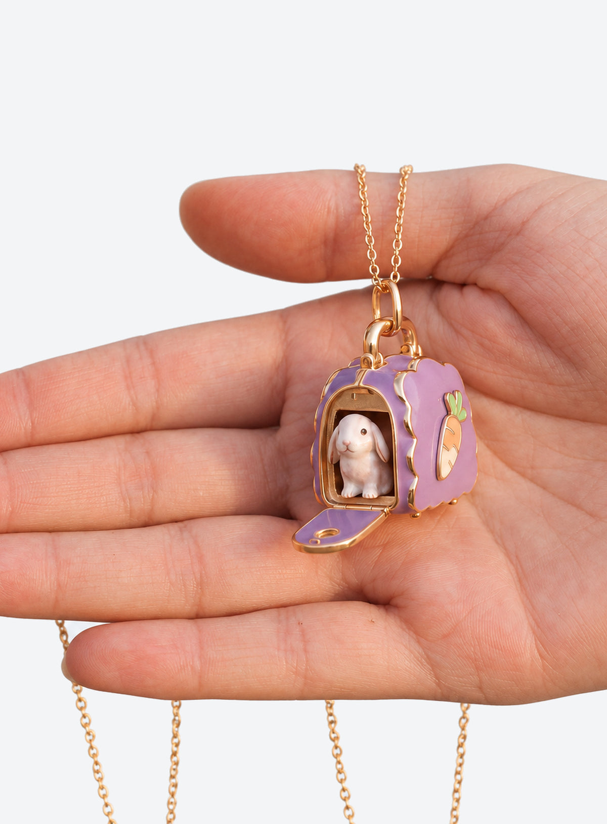 Pet carrier locket necklace with a tiny animal inside and decorative details on the carrier (Rabbit)
