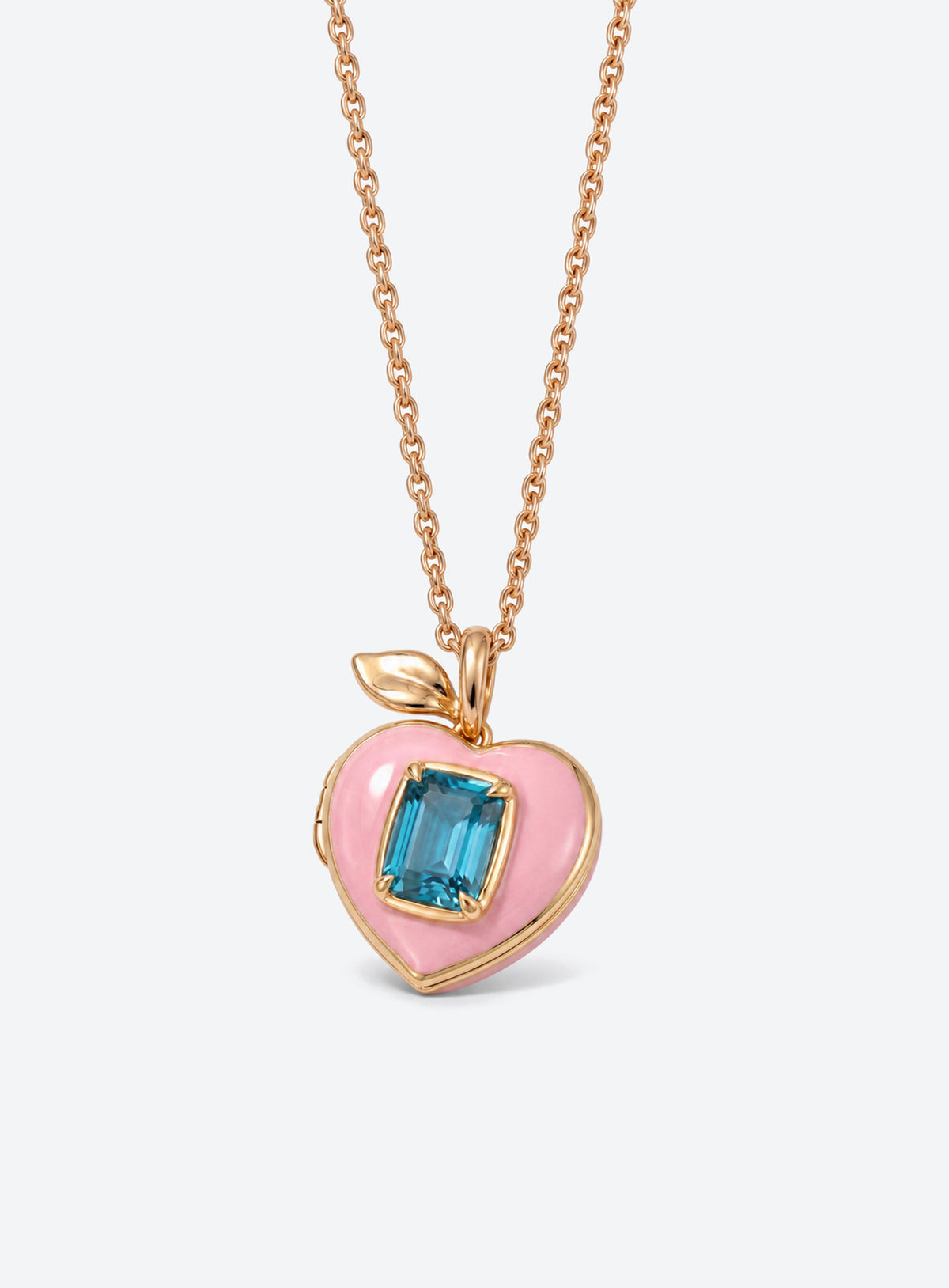 Pink heart locket necklace with gold-tone leaf detail at the top of the pendant (Zircon)