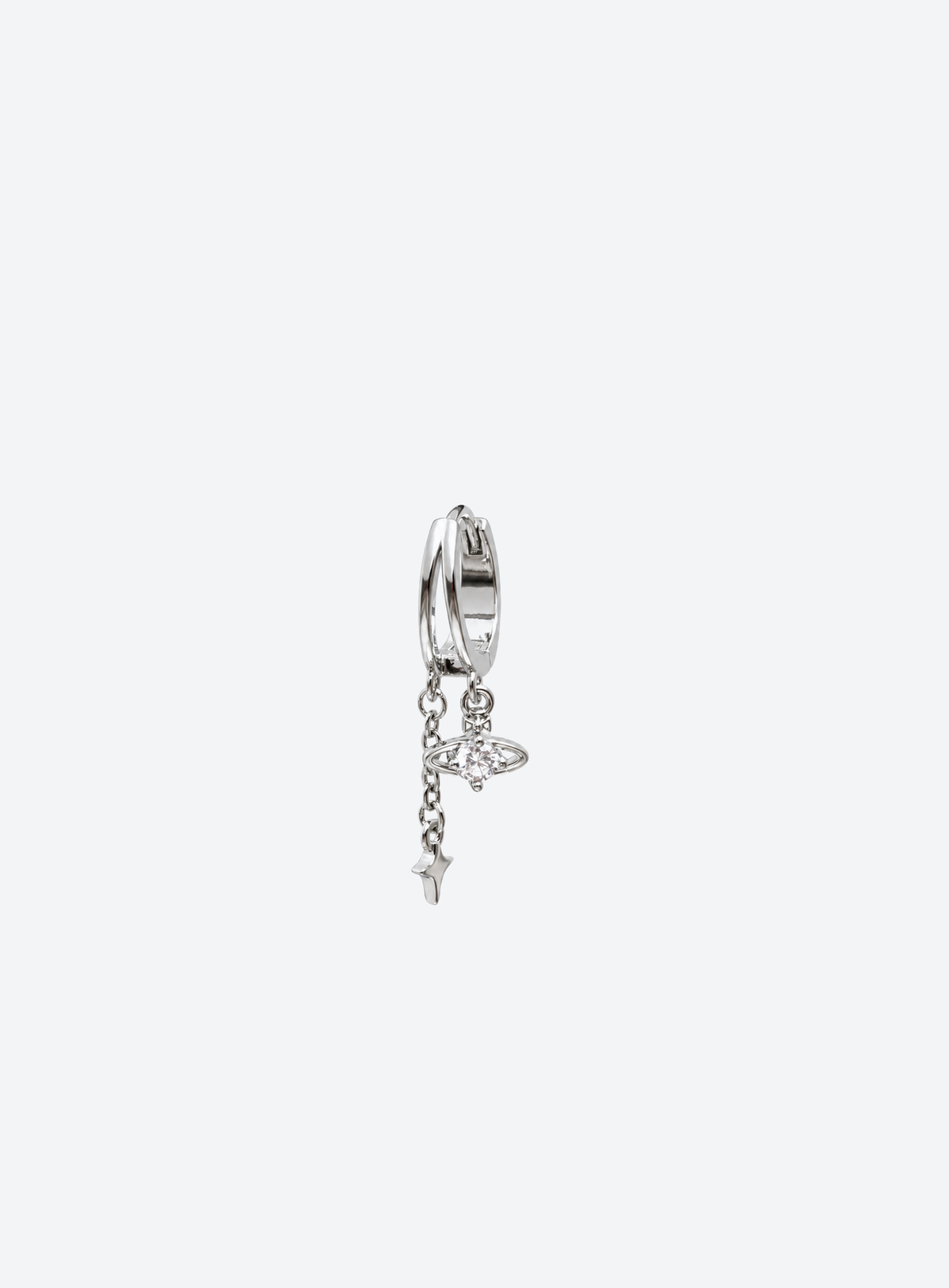 Silver-tone double-layer huggie design with a cubic zirconia planet and chain-hung star