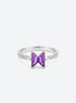 Purple geometric centerpiece ring with a narrow silver-tone or gold-tone band (Silver)