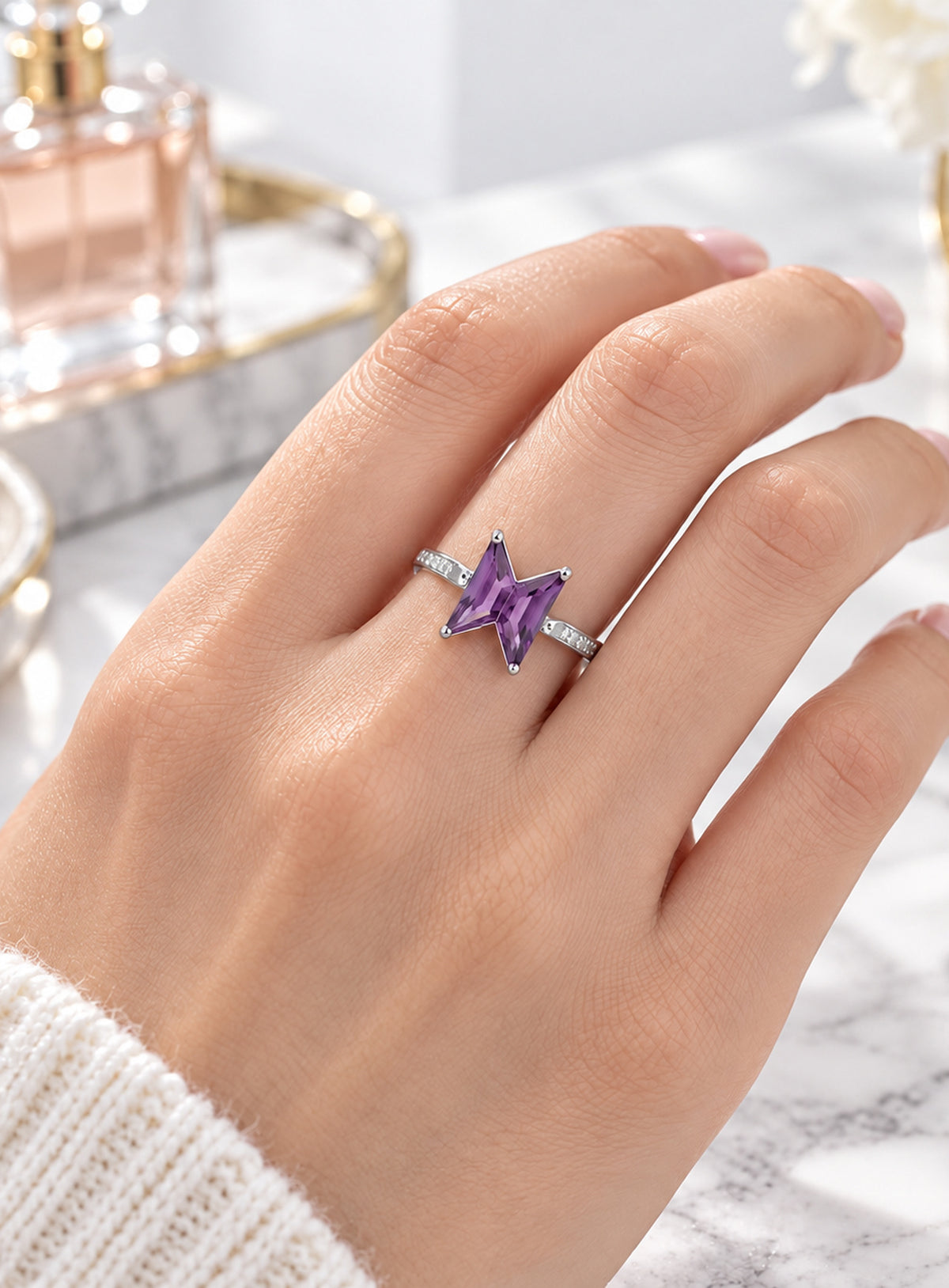 Purple geometric centerpiece ring with a narrow silver-tone or gold-tone band (Silver)