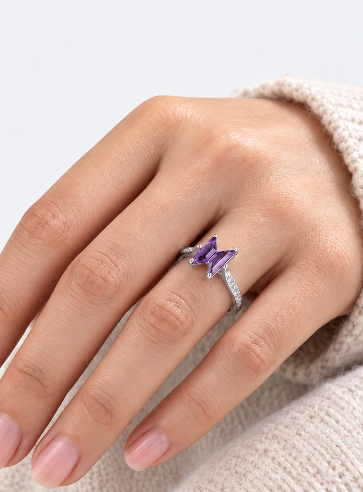 Purple geometric centerpiece ring with a narrow silver-tone or gold-tone band (Silver)