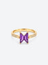 Purple geometric centerpiece ring with a narrow silver-tone or gold-tone band (Gold)