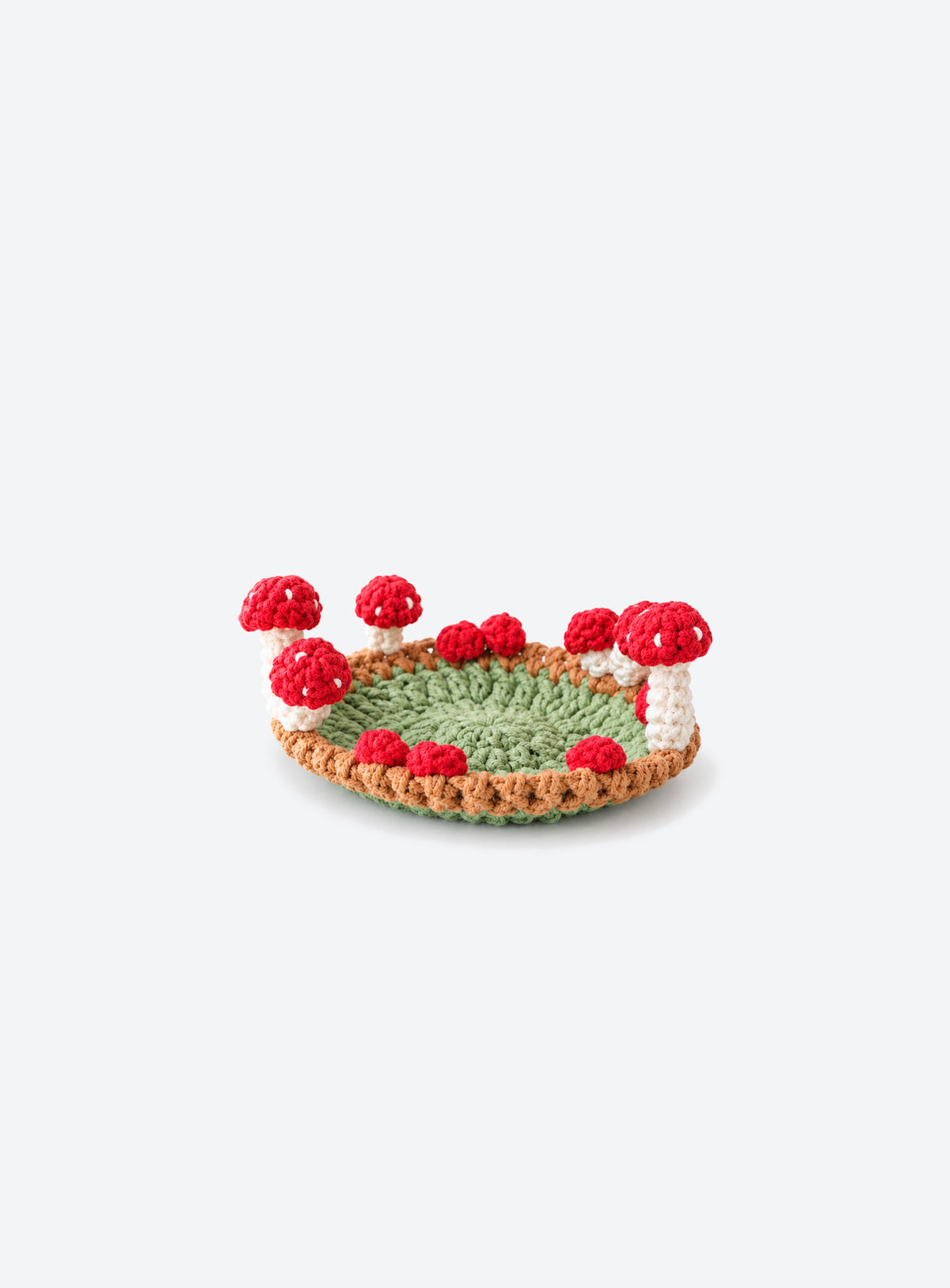 Handmade crochet coaster with raised decorative motifs around the edge (Mushroom)
