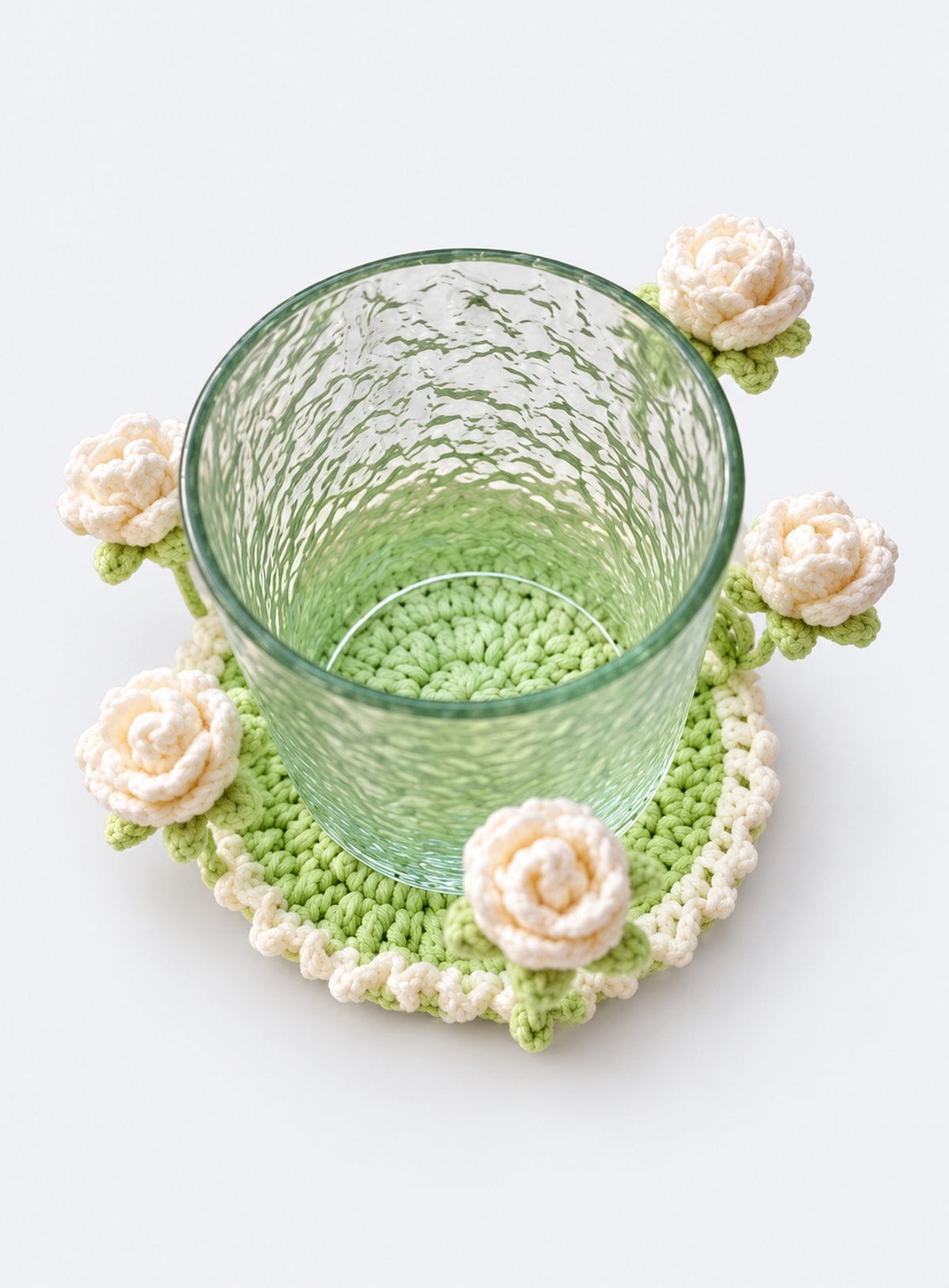 Handmade crochet coaster with raised decorative motifs around the edge (White Rose)