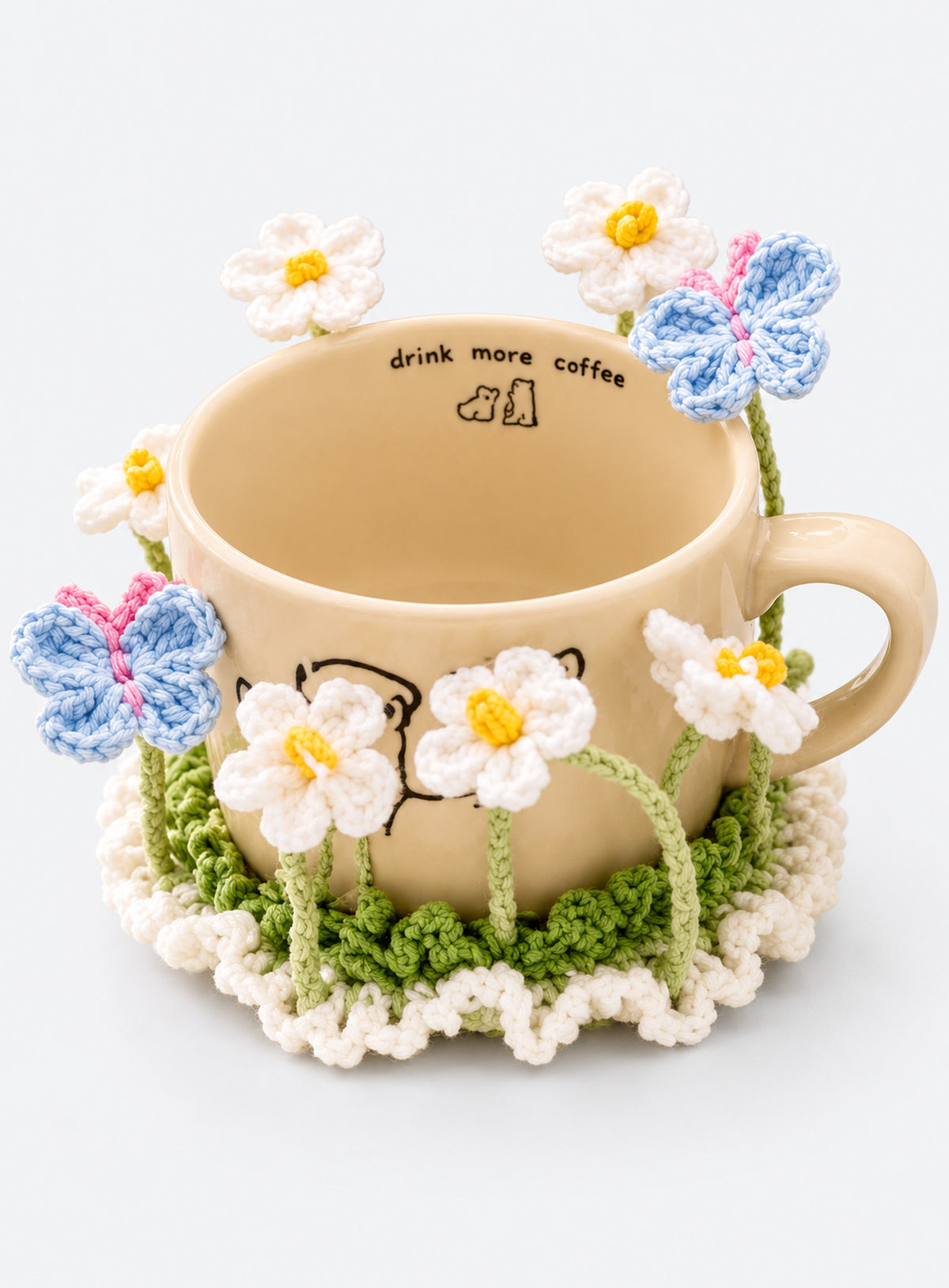 Handmade crochet coaster with raised decorative motifs around the edge (Daisy & Butterfly)