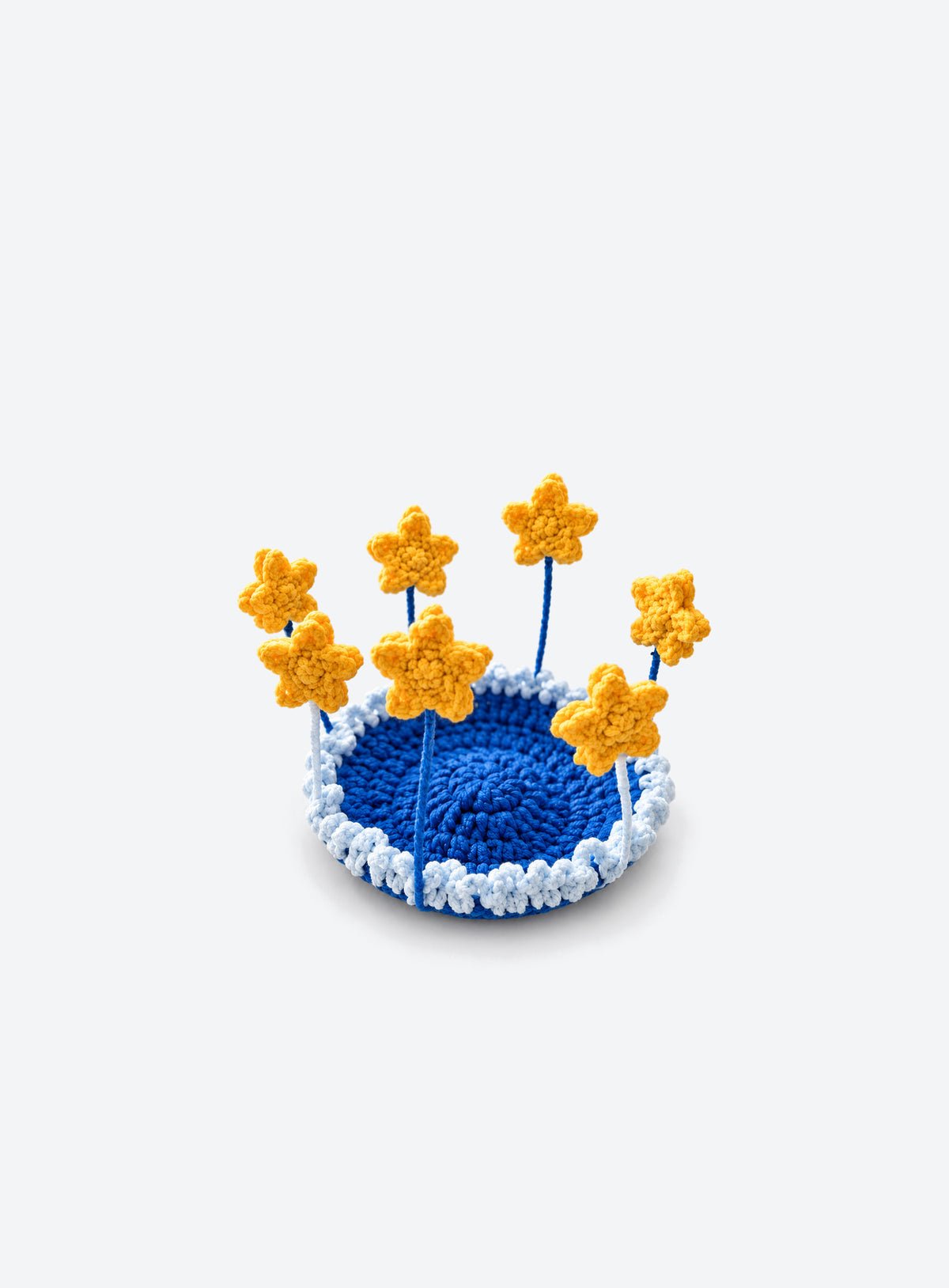 Handmade crochet coaster with raised decorative motifs around the edge (Yellow Stars)