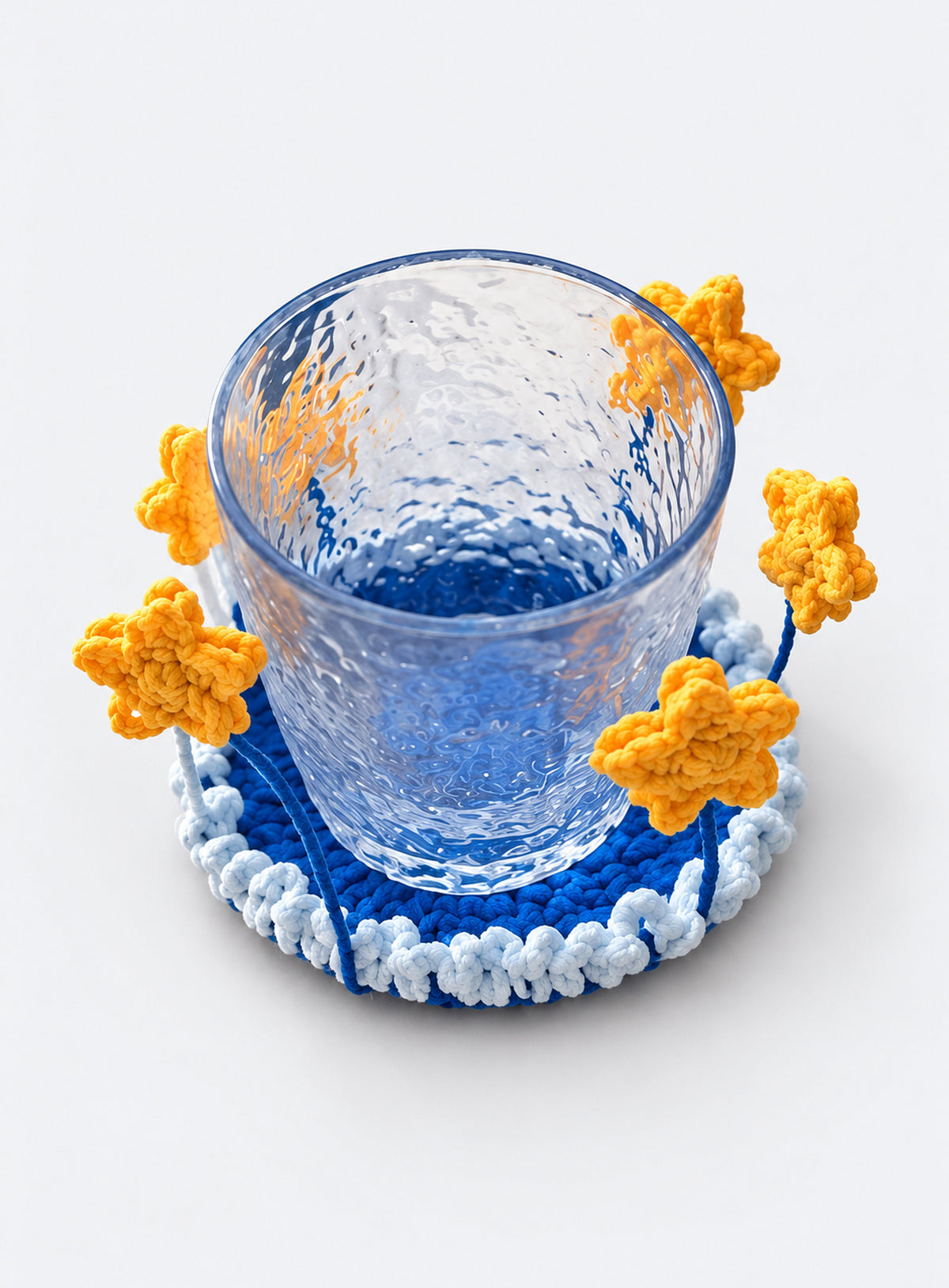 Handmade crochet coaster with raised decorative motifs around the edge (Yellow Stars)