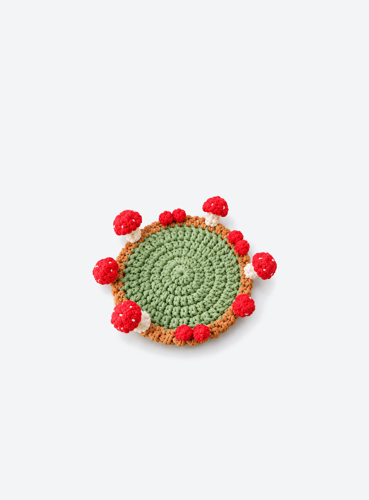 Handmade crochet coaster with raised decorative motifs around the edge (Mushroom)
