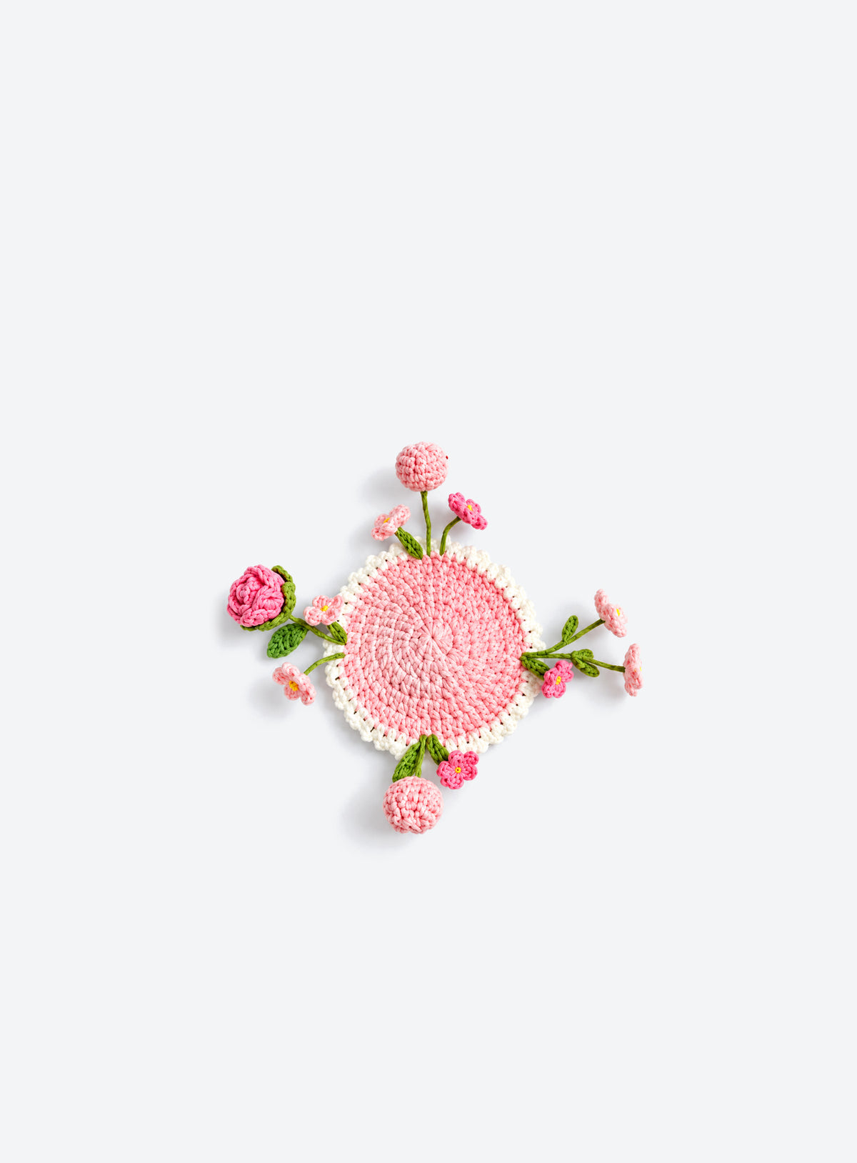 Handmade crochet coaster with raised decorative motifs around the edge (Mixed Flowers)