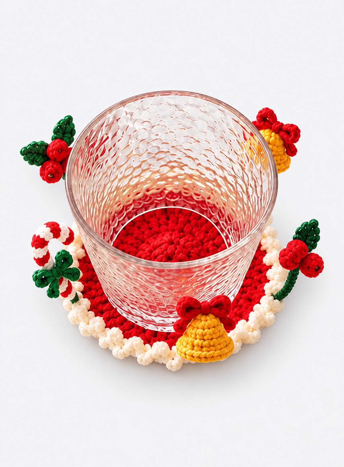 Handmade crochet coaster with raised decorative motifs around the edge (Christmas)