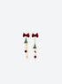 Asymmetric earrings with red velvet bows, green trees, gold-tone chains, snowflakes, red pom-poms and a heart