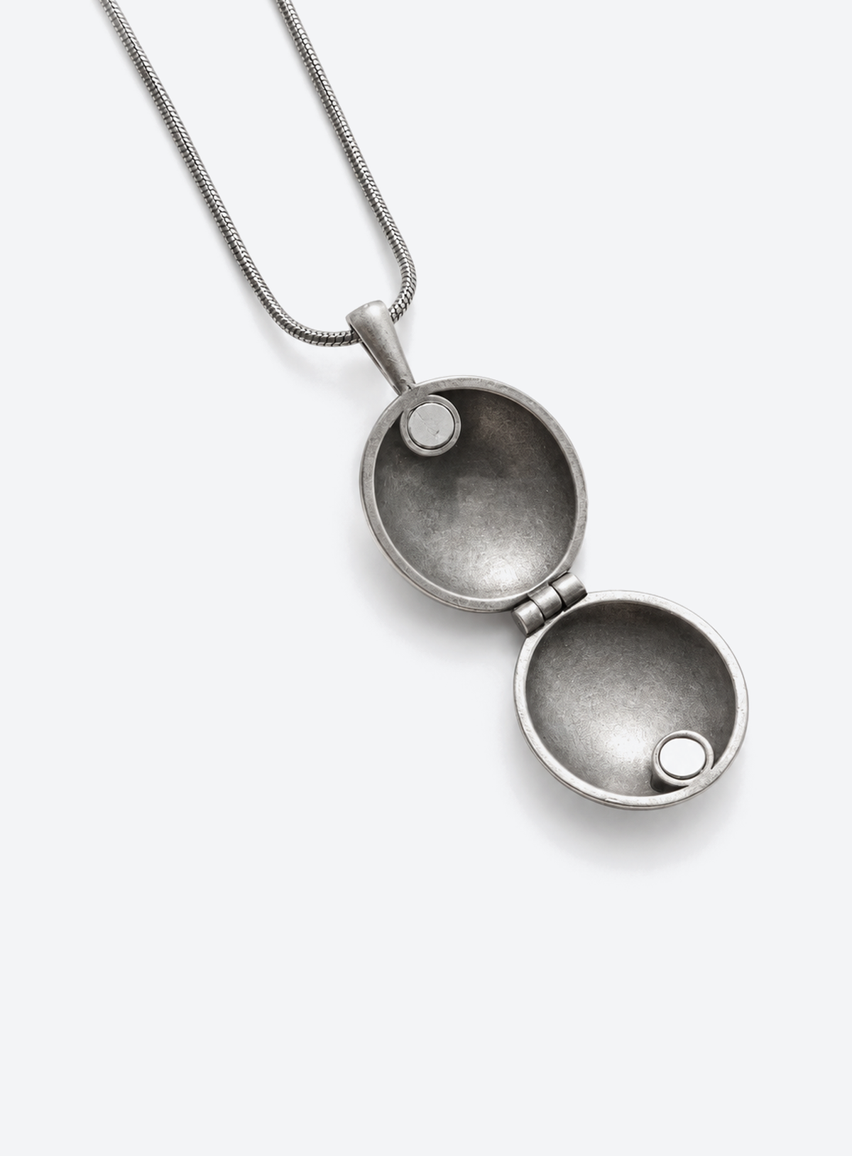 Gothic locket pendant with a red stone on a chain