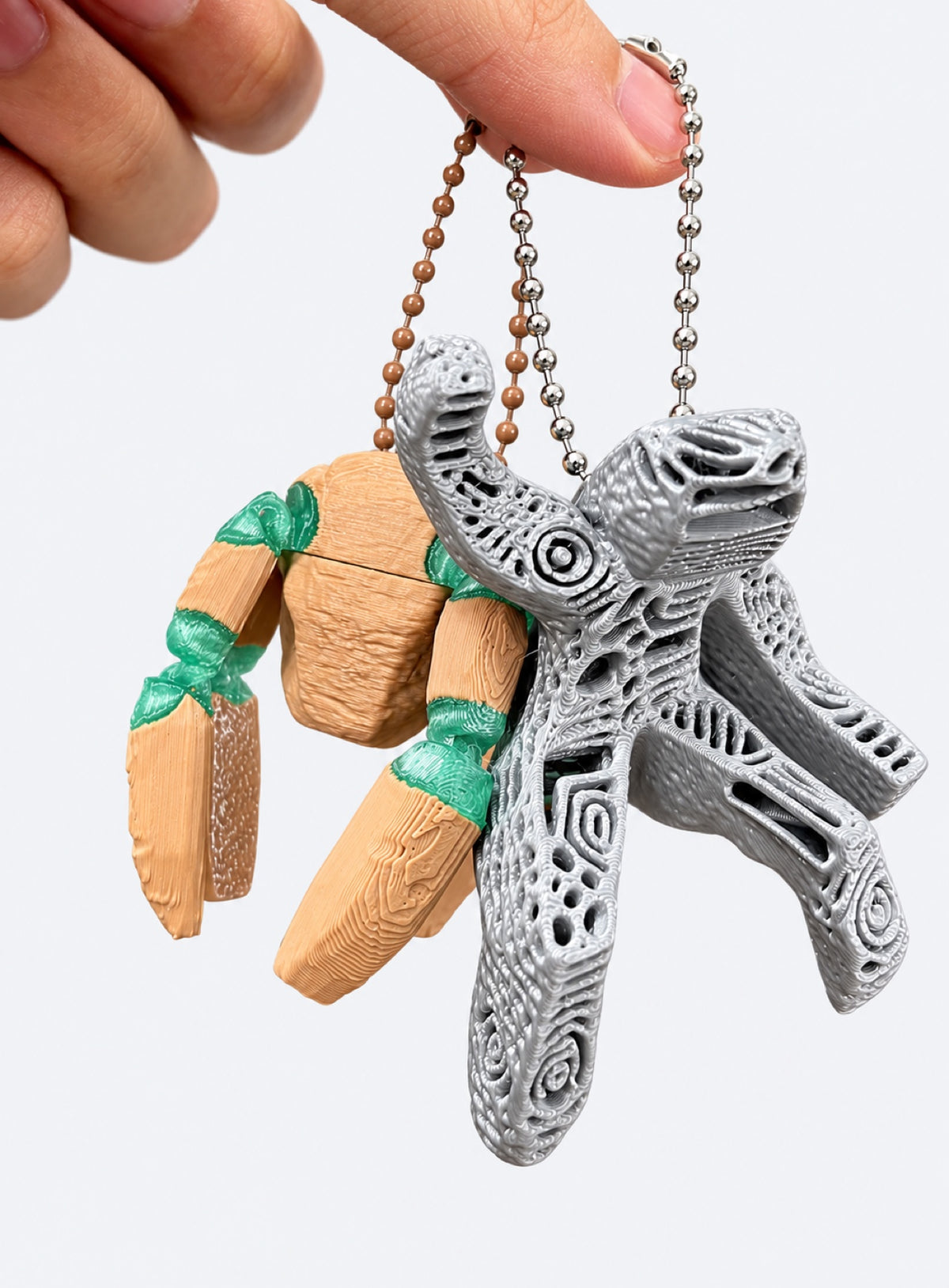 Rocky and Grace character keychain charms with bead chains