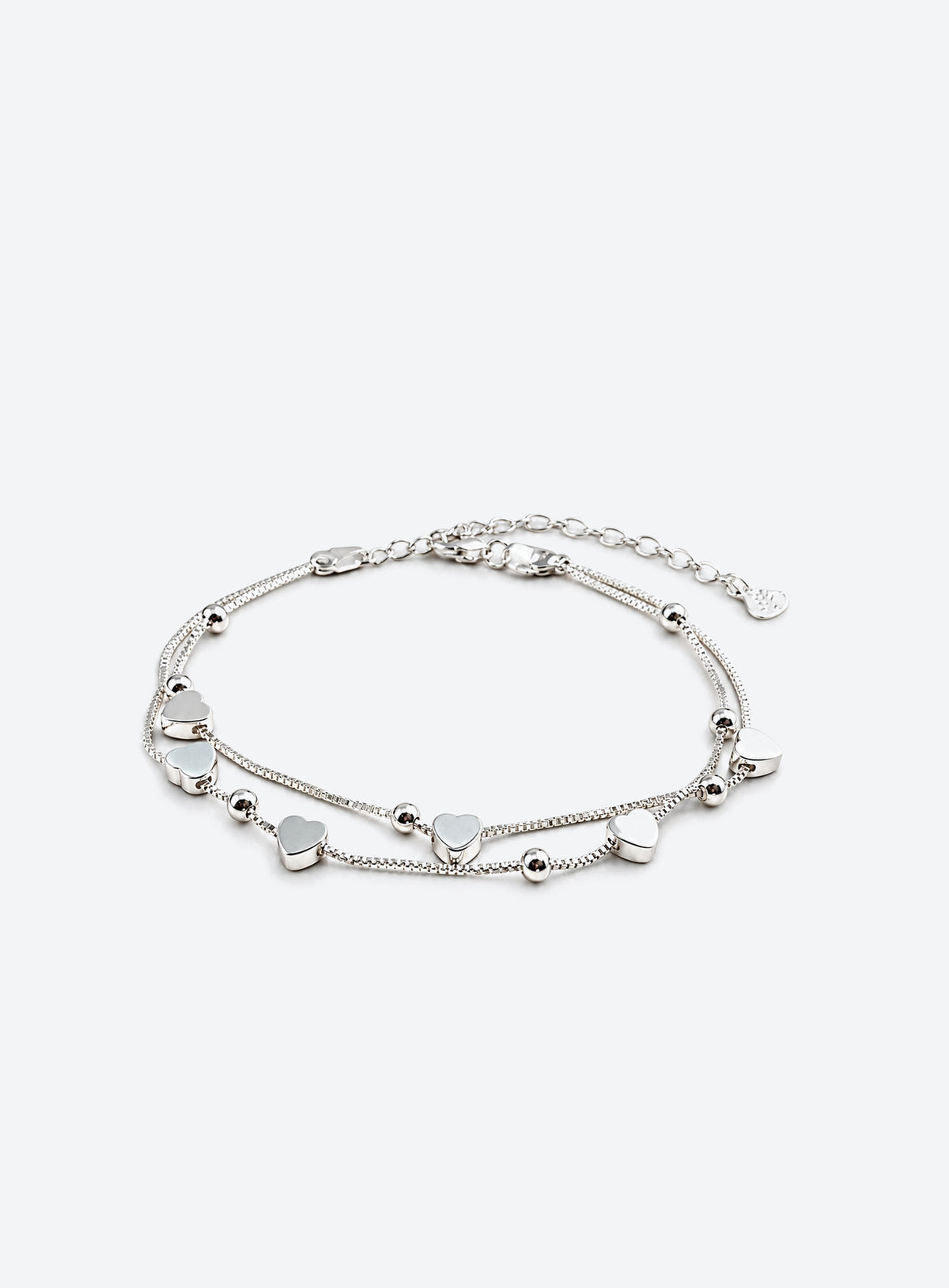 Sterling silver chain bracelet with six heart-shaped beads and an adjustable lobster clasp