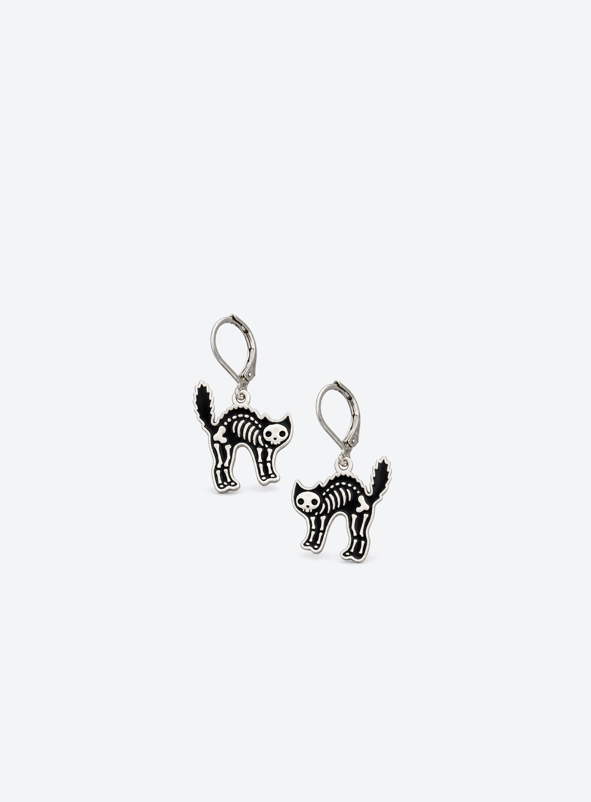 Black enamel skeleton cat earrings with silver-tone outlines and leverback hooks