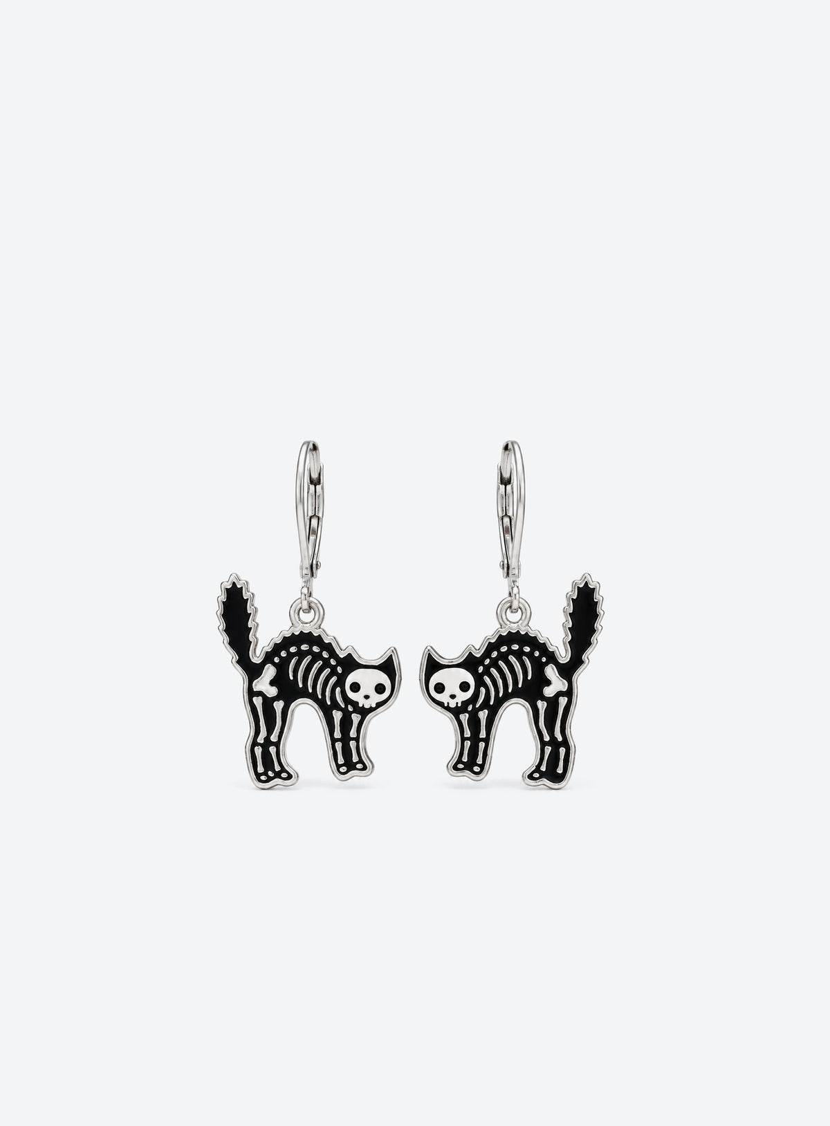 Black enamel skeleton cat earrings with silver-tone outlines and leverback hooks