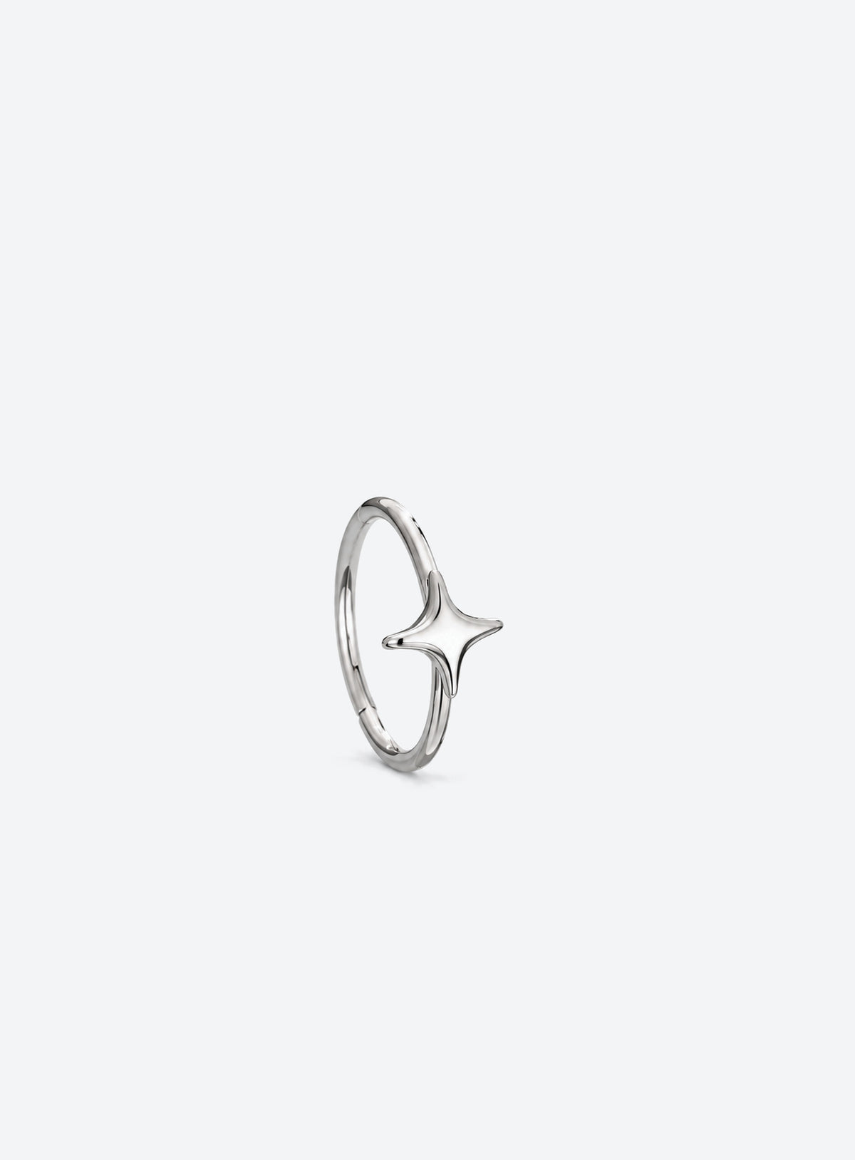 Star detail nose hoop with hinged clicker closure, shown in a studio product photo (Silver)
