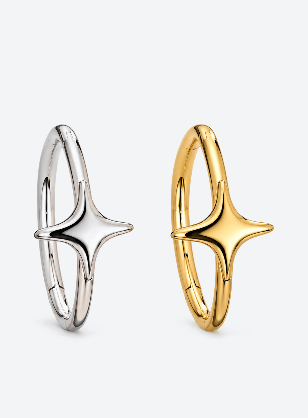Star detail nose hoop with hinged clicker closure, shown in a studio product photo