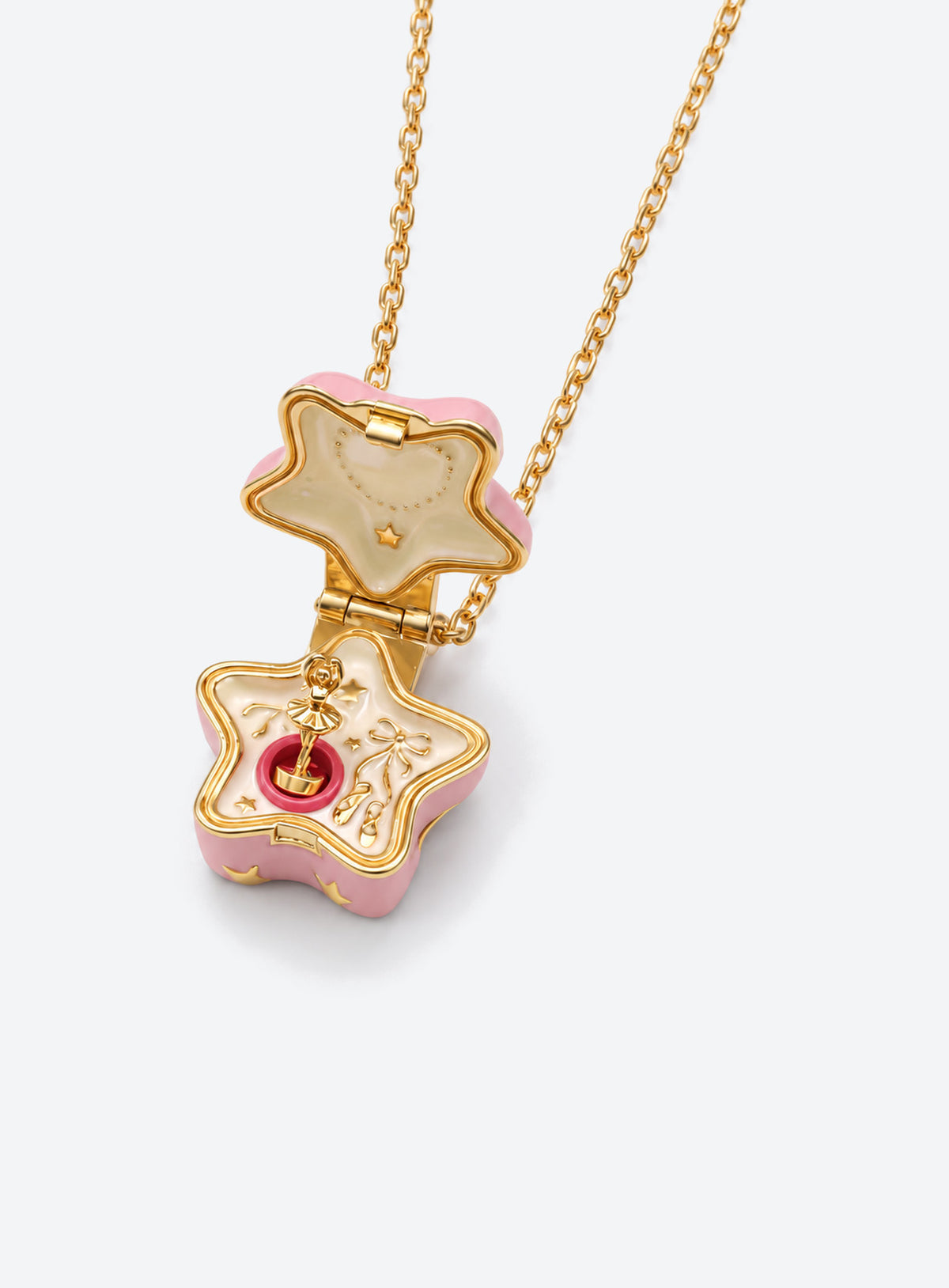 Star-shaped enamel locket necklace with a gold-tone chain and raised decorative motifs (Pink)