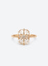 Slim silver or gold ring with clear rectangular centre, starburst motif and small clear accents