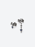 Silver-tone thorn ear cuff with blue accents and a dangling pointed star