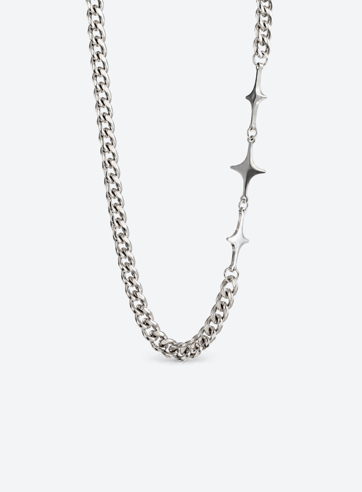 Silver-tone chain necklace with three spaced four-point starburst shapes