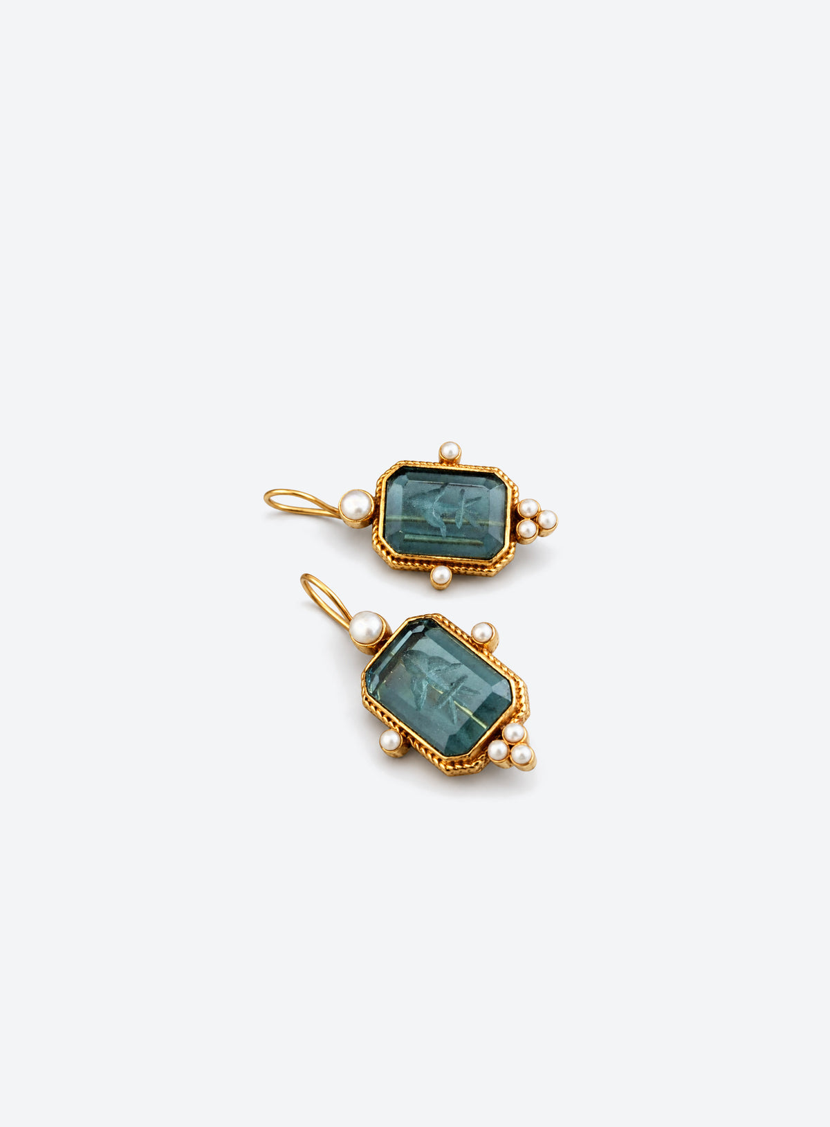 Vintage-style drop earrings with colored accents and gold-toned decorative borders