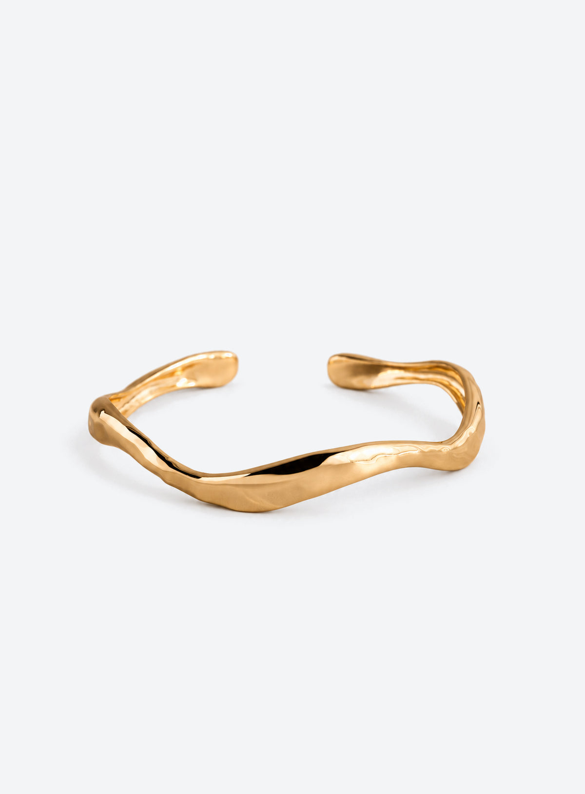 Open cuff bracelet with sculpted wavy edges and a textured polished surface (Gold)