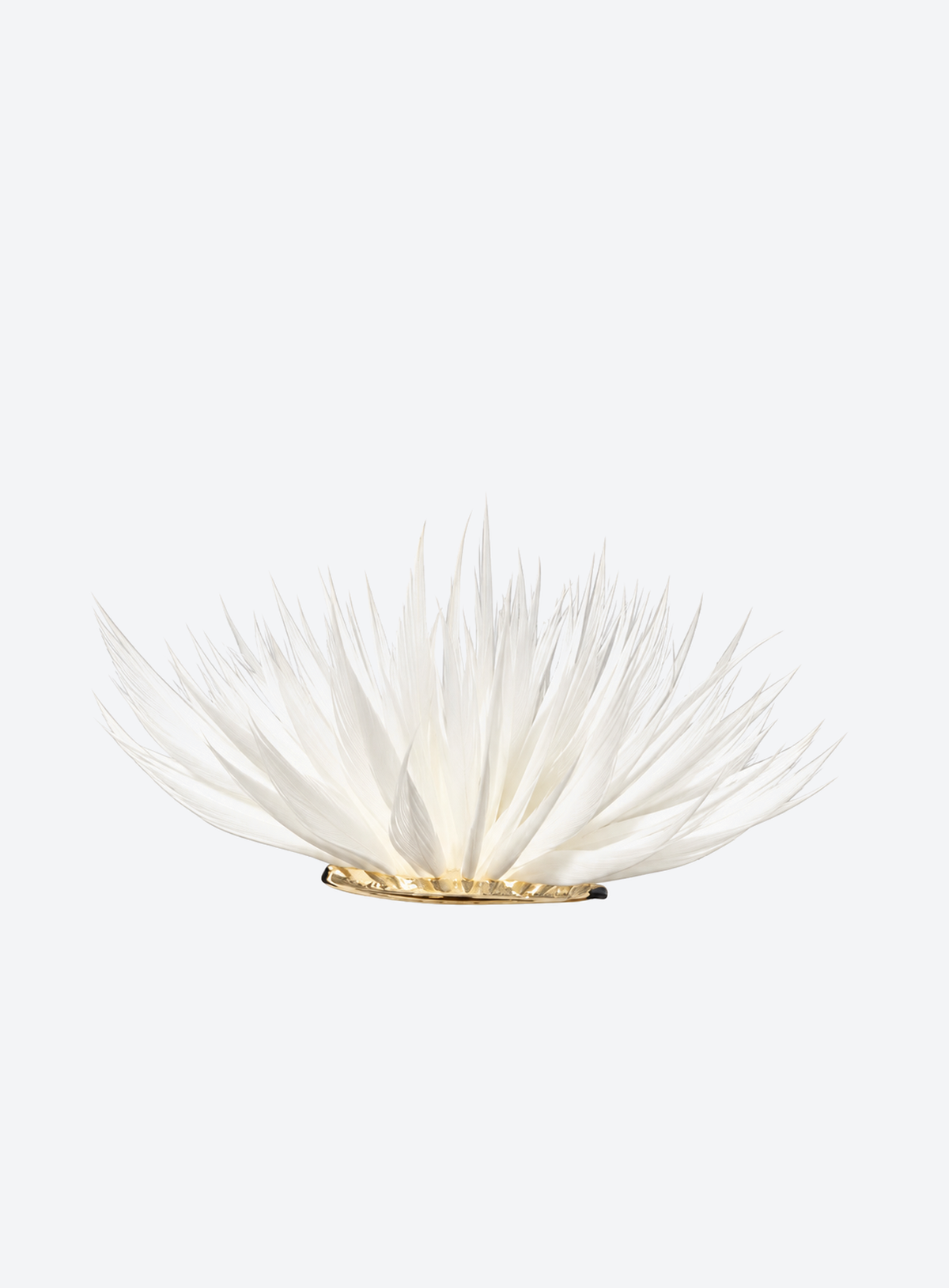 White stud earrings with natural feathers arranged into flower shapes
