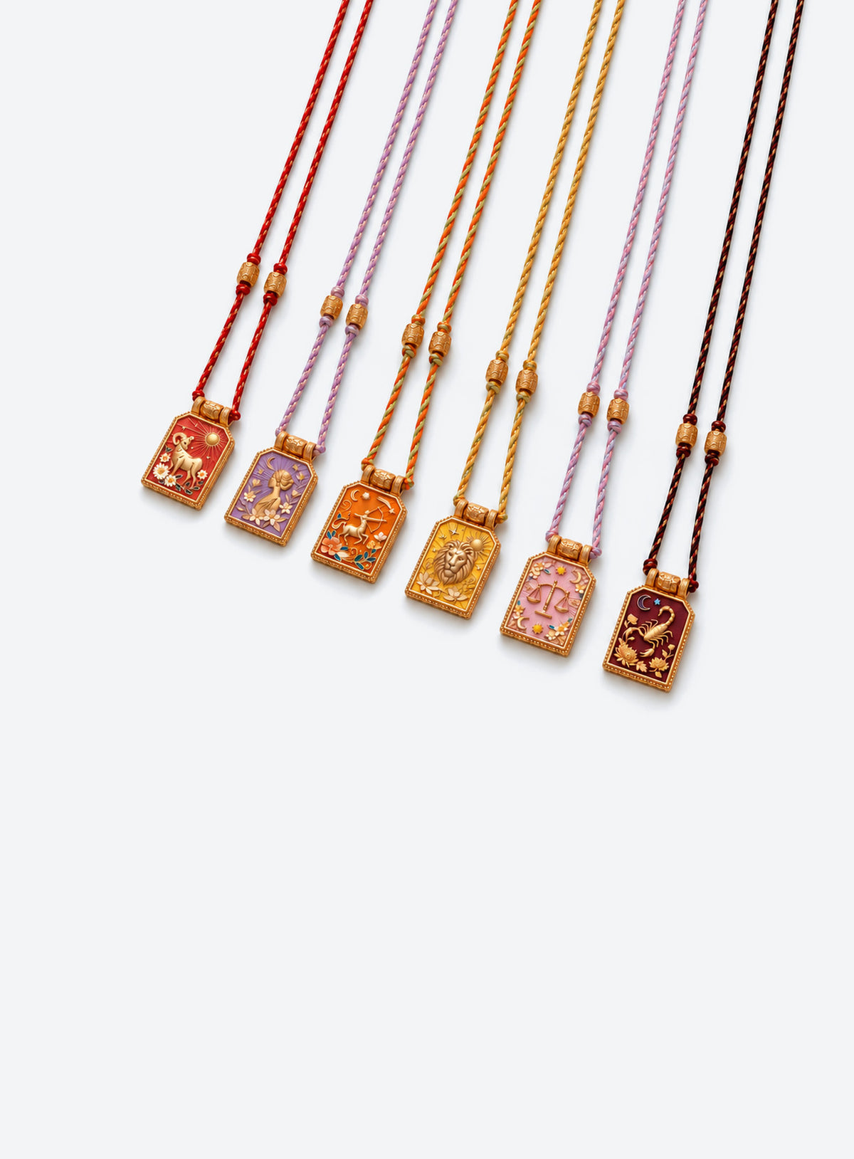 Rectangular zodiac tarot pendant necklace with colorful enamel artwork and a matching braided cord