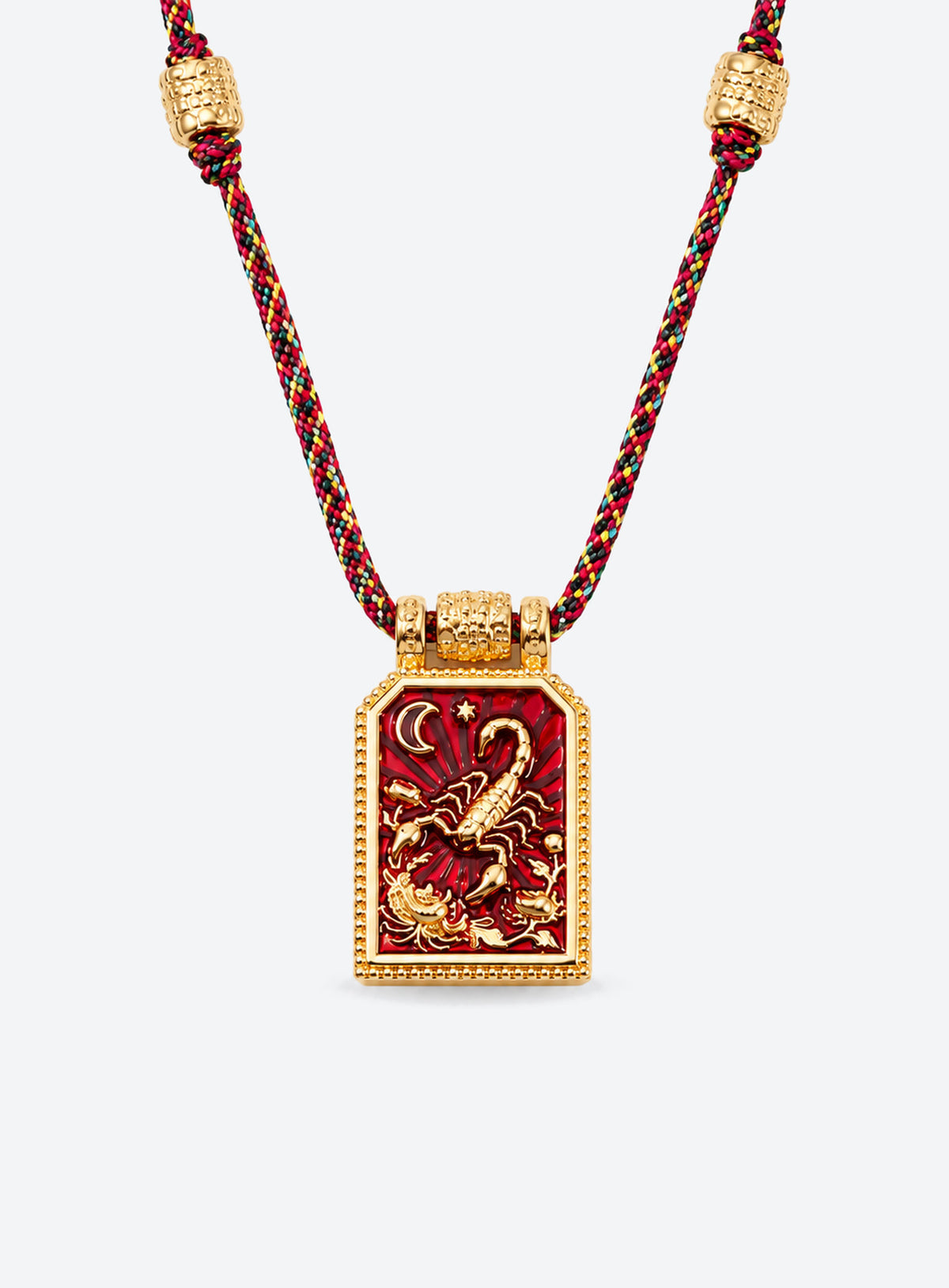 Rectangular zodiac tarot pendant necklace with colorful enamel artwork and a matching braided cord (Scorpio)